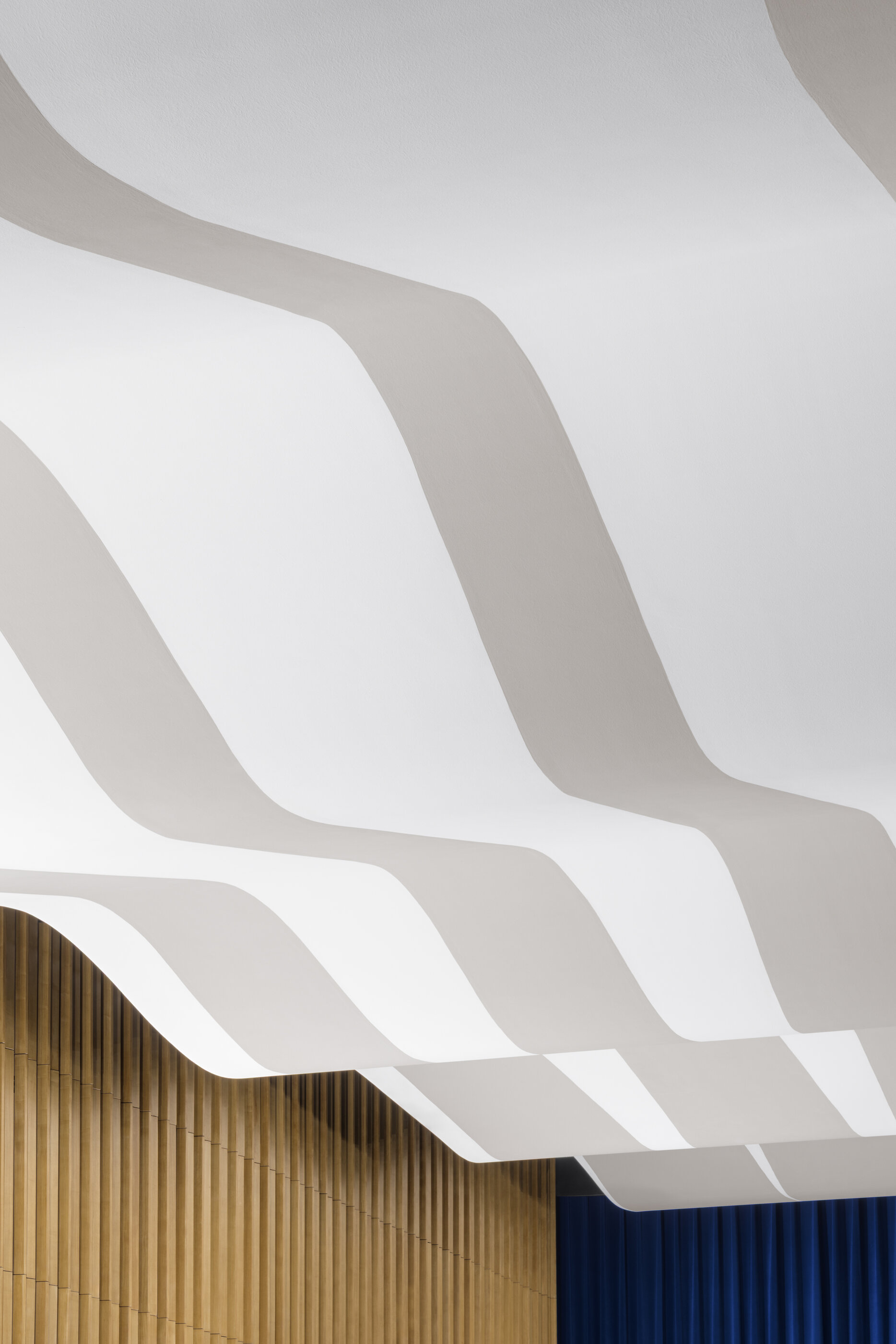 The sculptural curved ceiling of the auditorium of Kino International
